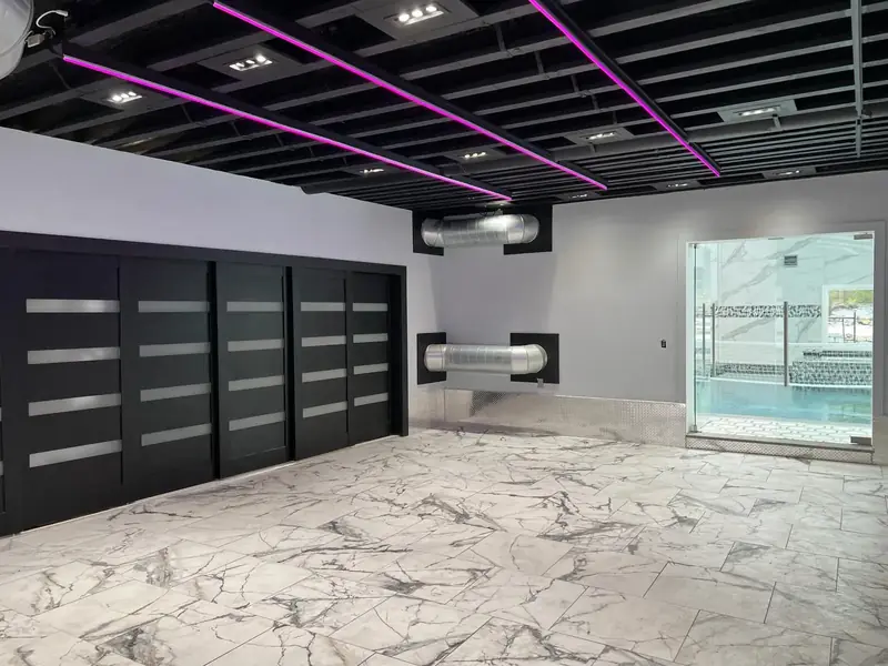 garage with grid of linear ceiling lights, North Caldwell, NJ