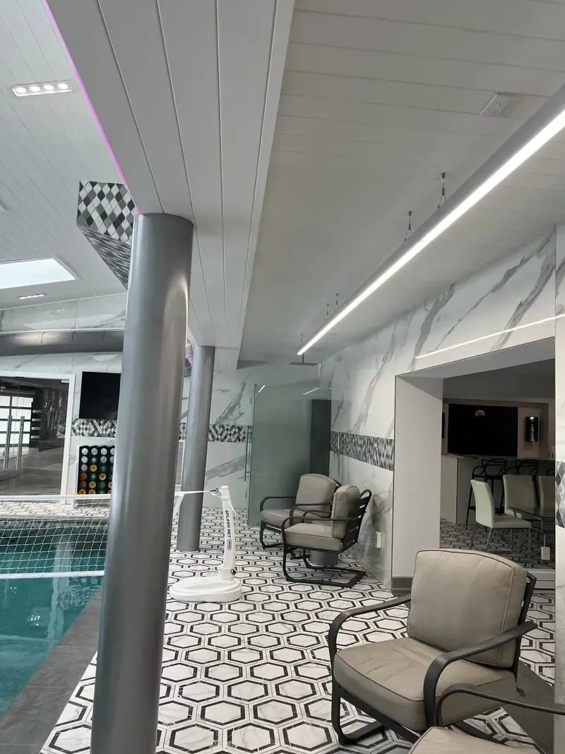 indoor pool with linear ceiling lighting, North Caldwell, NJ
