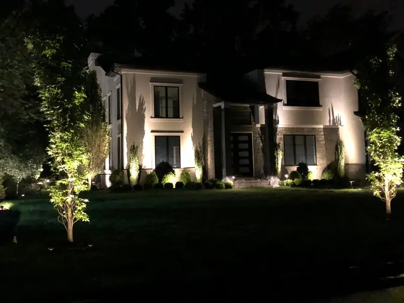 illuminated home facade and landscaping at night, Florham Park, NJ