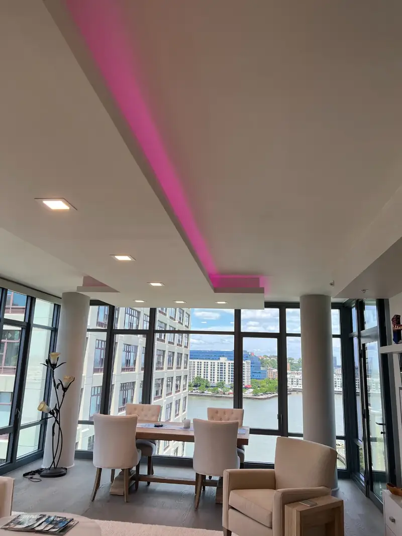 Apartments, Hoboken, NJ: apartment living space with cove lighting