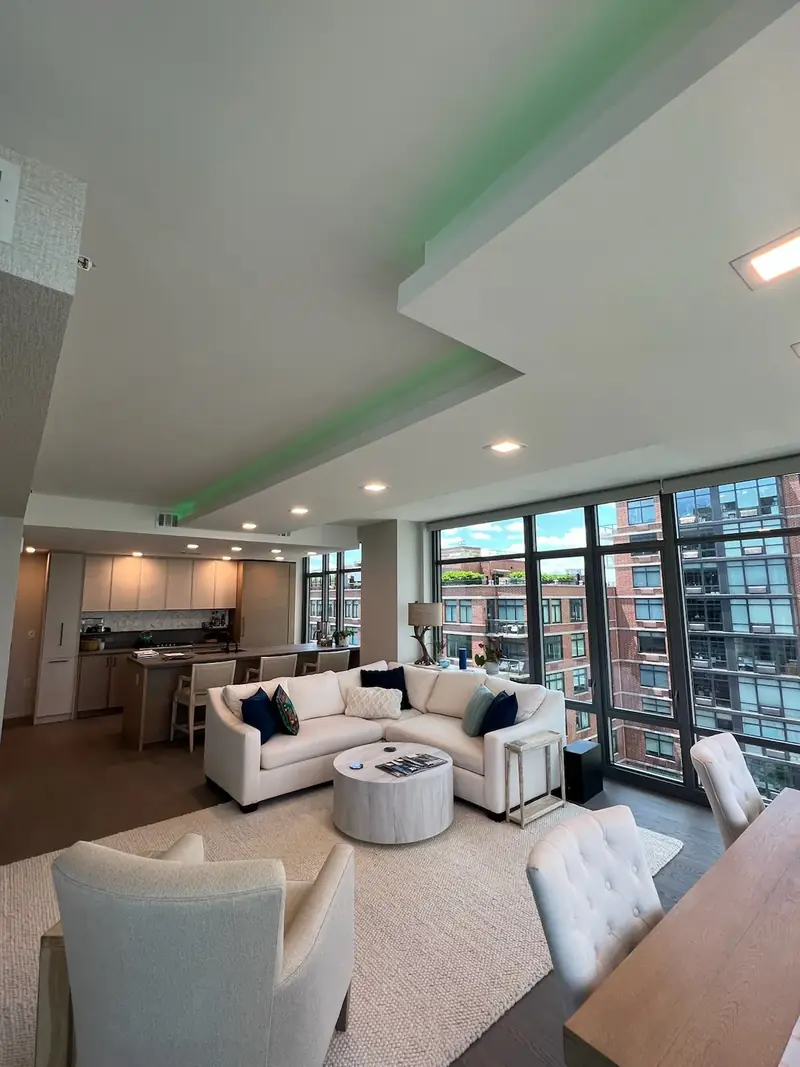 apartment living room with a floating ceiling and cove lighting, Hoboken, NJ